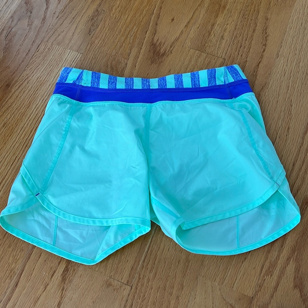 Ivivva by Lululemon mint green/purple shorts size 12
